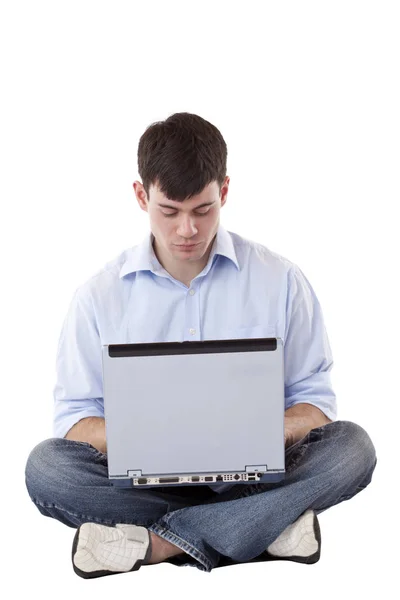 Jovem Bonito Homem Senta Com Computador Escreve Maill Isoliert Uma Imagem De Stock