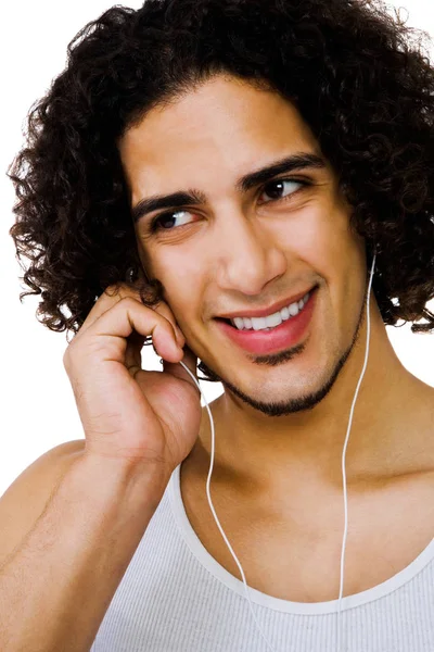 Jovem Ouvindo Música Com Fones Ouvido Isolados Sobre Branco — Fotografia de Stock