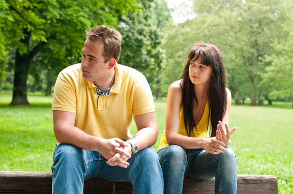 Young Couple Sitting Outdoors Bench Having Relationship Problems Stock Image