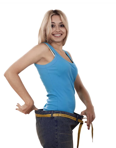 Joven Mujer Feliz Midiendo Cintura Sobre Fondo Blanco — Foto de Stock