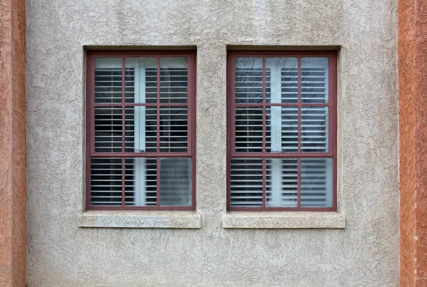 Two Maroon Bordered Windows Stucco Wall — Stock Photo, Image