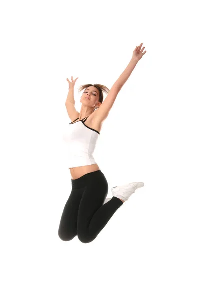 白い背景で隔離の美しい若い女性の物理的な訓練 エアロビクス — ストック写真