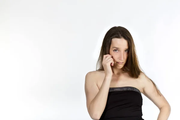 Jovem Mulher Com Mão Bochecha Olhando Para Câmera — Fotografia de Stock