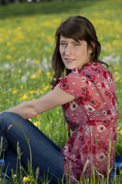 Young Woman Relaxing Spring Meadow — ストック写真