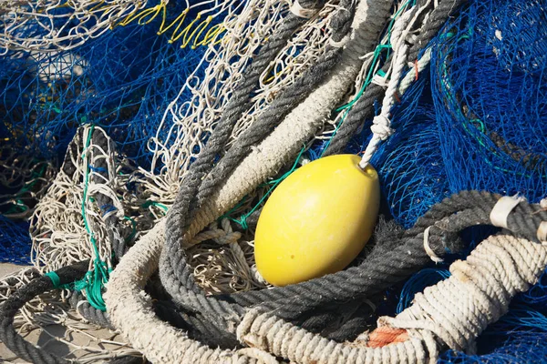close-up commercial fishing netting and ropes