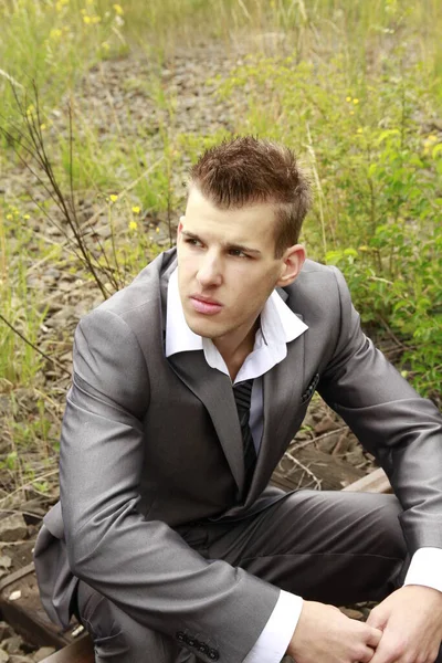 Businessman Relaxing Train Tracks — Stock Photo, Image