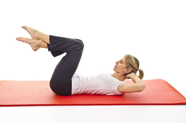 Mujer Joven Haciendo Ejercicio Yoga Sobre Fondo Blanco — Foto de Stock