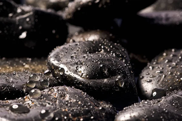 Muitas Pedras Spa Preto Com Gotas Muitas Águas — Fotografia de Stock