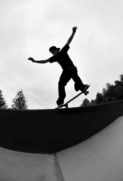 Perfect Silhouette Skateboarder Doing Trick Skate Park Royalty Free Stock Images