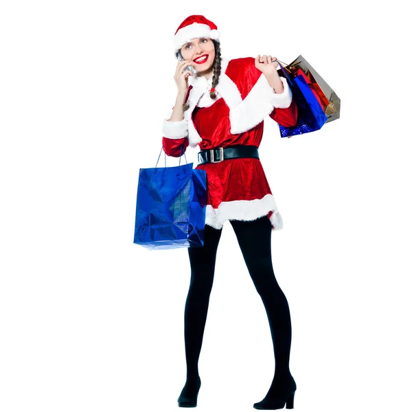 Een Gelukkige Vrouw Verkleed Als Kerstman Dragen Telefoon Kerst Tassen — Stockfoto