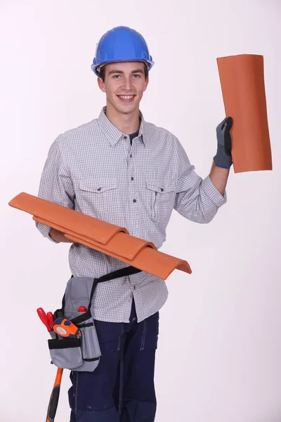 Roofer Showing Tiles Studio Shot — Stock Photo, Image