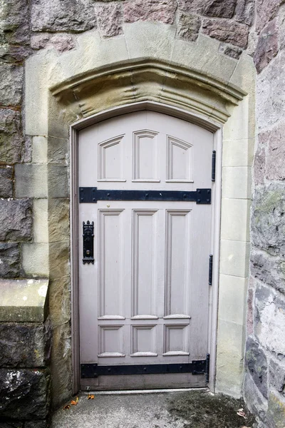 Gray Wood Door Side Old Stone Chruch Royalty Free Stock Photos