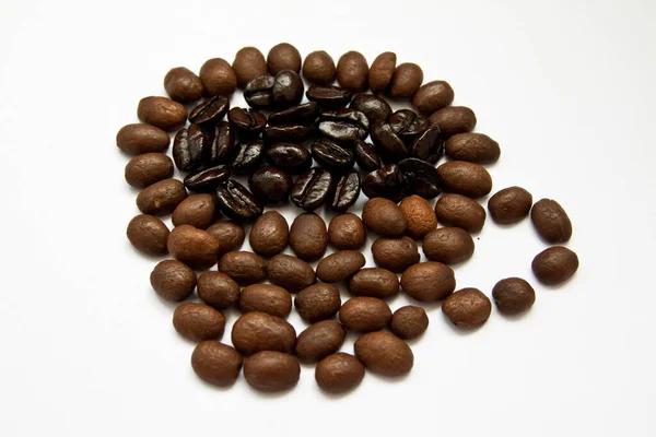 背景にコーヒー豆があります — ストック写真