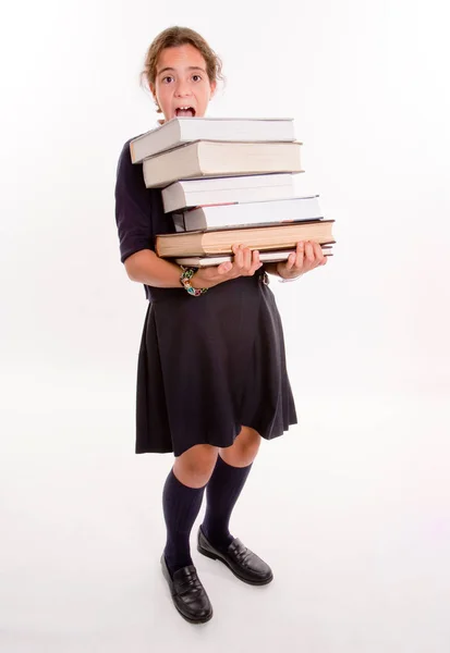 Μαθήτρια Που Κουβαλάει Ένα Σωρό Βιβλία — Φωτογραφία Αρχείου