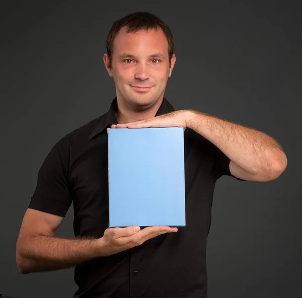 Young Man Holding Blank Card — Stock Photo, Image