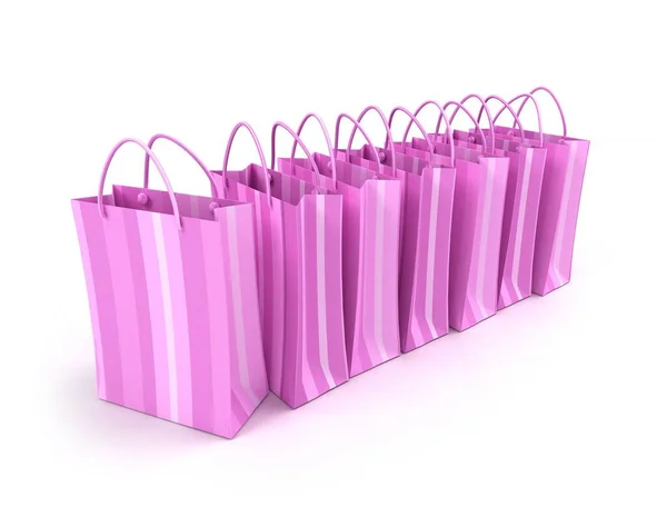 在白色背景的衬托下 粉色购物袋排成一排 — 图库照片