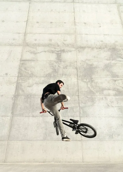 Young Bmx Bicycle Rider Grey Urban Concrete Background — Stock Photo, Image