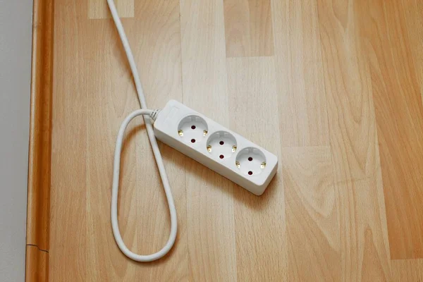 Prolunghe Elettriche Sul Parquet — Foto Stock