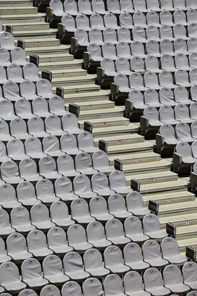 Rows of seats in an open-air theater