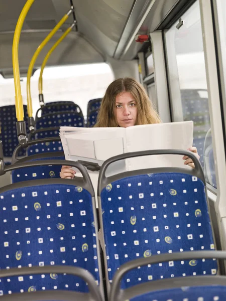 Young Woman Newspaper Bus — Stock Photo, Image