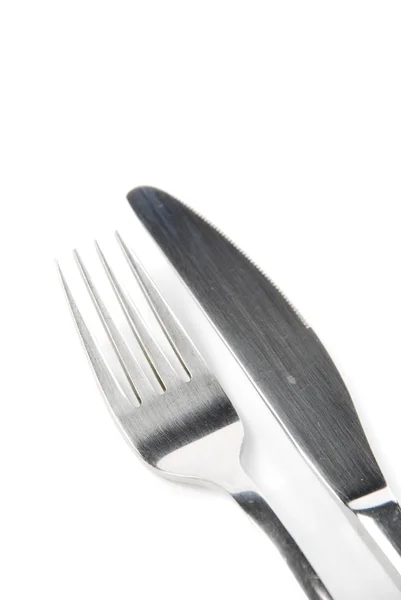 在白色背景上隔离的叉子和刀片 — 图库照片