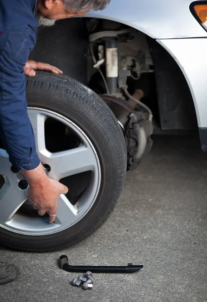 Garage Mechanic Changing Wheel Modern Car Color Toned Image Stock Picture