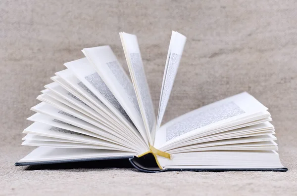 Open Book Burlap Backkground — Stock Photo, Image