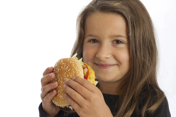 Дівчина Тримає Гамбургер — стокове фото