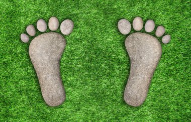 foot symbol of stone in the grass clipart