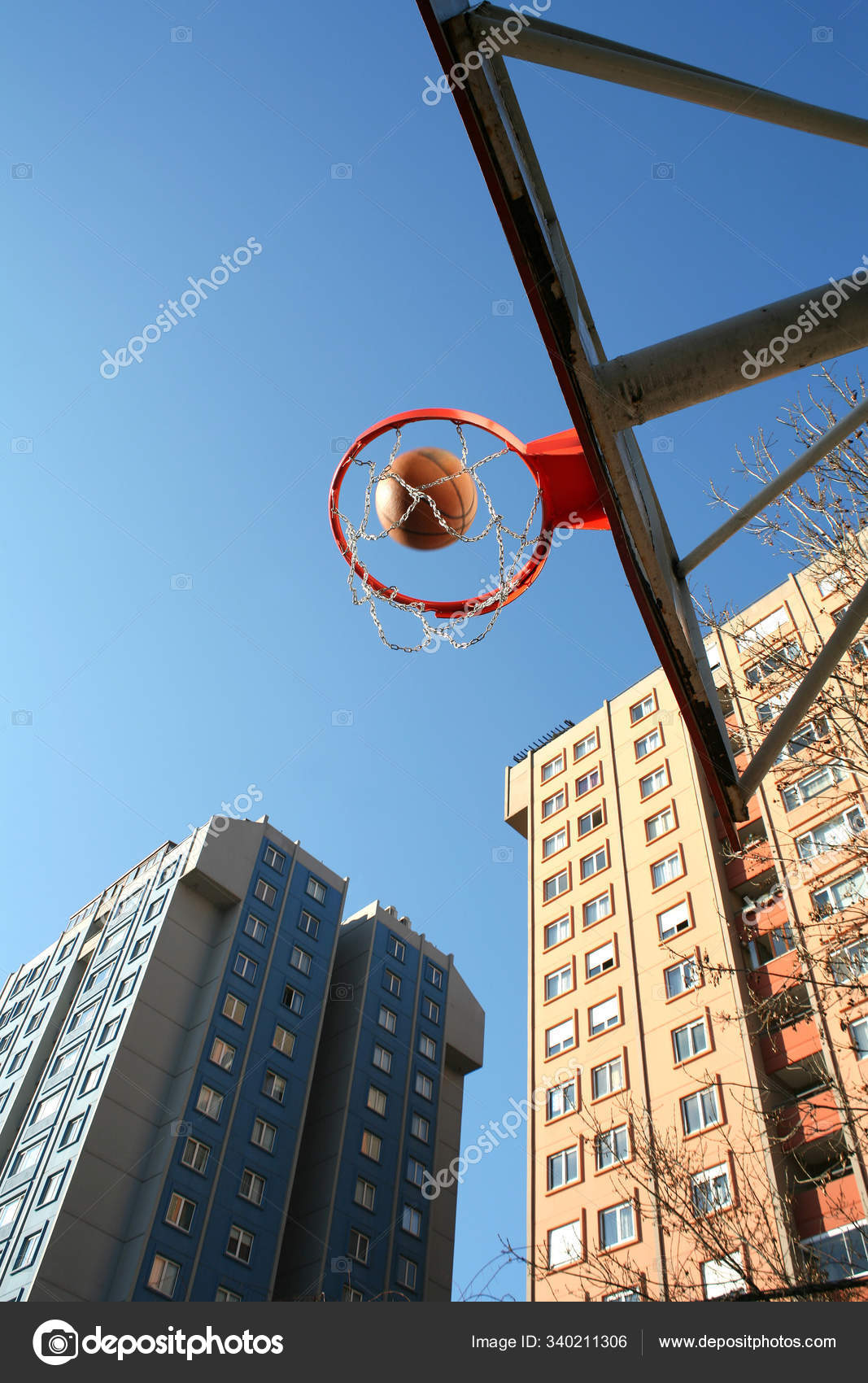 Image Basketball Pot Ball Buildings Stock Photo by ©PantherMediaSeller