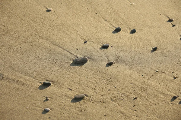 Крупним Планом Знімок Галькових Каменів Піщаному Пляжі — стокове фото