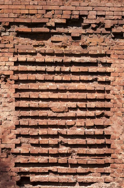古城墙上被毁坏的部分砖 形成了一个模式 — 图库照片