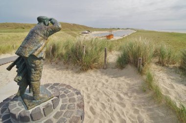 Camperduin, a totally new createt beach area (start of building: 2015), the dunes, the sculpture De Strandvonder, the new lagoon with play ship The Battle of Camperdown 1797 and the North Sea, North Holland clipart