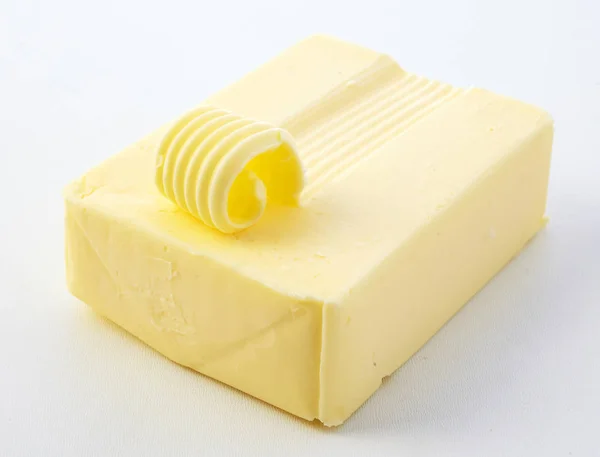 Close Still Life View Block Butter Single Fork Curl Top — Stock Photo, Image