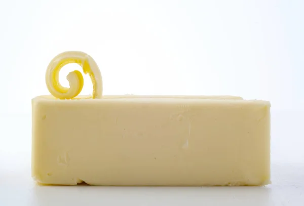 Pat Fresh Farm Butter Partially Cut Curl Top Elegant Presentation — 스톡 사진