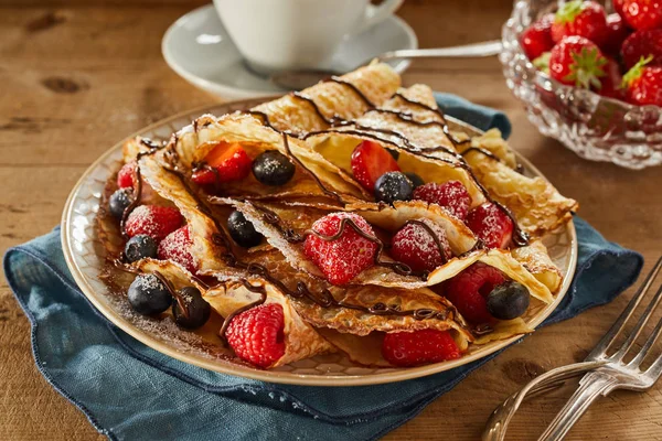 Plated Freshly Made Golden Berry Pancakes Filled Raspberries Strawberries Blueberries — Stock Photo, Image