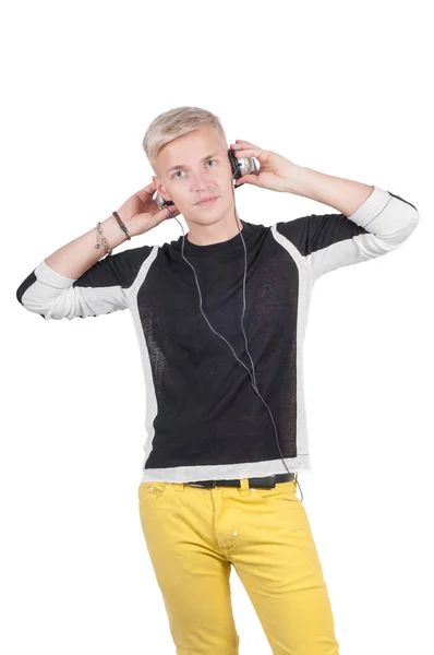 Hombre Con Auriculares Jeans Amarillos Lissening Música Aislado Blanco Con — Foto de Stock