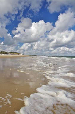 The North Sea, the sandy beach, stormy weather and a lot of clouds, De Banjaard, North Beveland, Zeeland, The Netherlands clipart