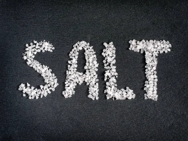 Salt Word Coarse Sea Salt Stone Flat Lay Top View — Stock Photo, Image