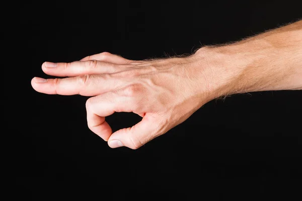 Mężczyzna Kaukaski Ręka Pokazując Znak Palce Przed Czarny Tło — Zdjęcie stockowe