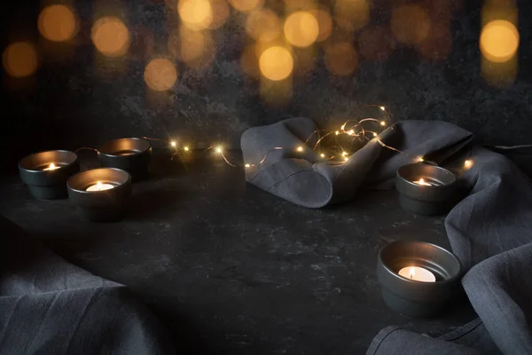 Dark Decoration Candles Lights Golden Bokeh Black Stone Background — Stock Photo, Image