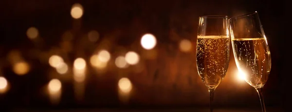 Champagne Bril Feestelijke Donkere Achtergrond Met Gouden Bokeh — Stockfoto