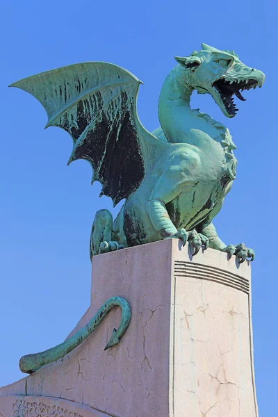 Statue on the Dragon Bridge in Ljubljana in Slovenia