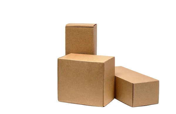 Χάρτινα Κουτιά Για Εμπορεύματα Λευκό Φόντο Διαφορετικό Μέγεθος Απομονωμένα Λευκό — Φωτογραφία Αρχείου