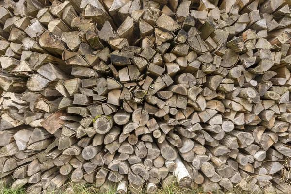 Old Weathered Firewood Stacked Format Filling Background — Stock Photo, Image