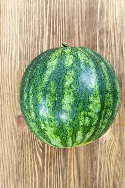 One Watermelon Green Color Stripes Peel Lie Wooden Table — Stock Photo, Image