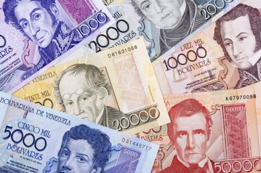 Old Venezuelan money, a business background  clipart