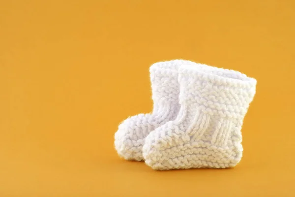 Pair Small Baby Socks Orange Background — Stock Photo, Image