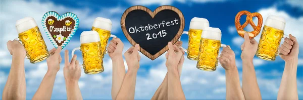 Many Hands Holding German Oktoberfest Beer Heart Shaped Gingerbread Blackboard — Stock Photo, Image