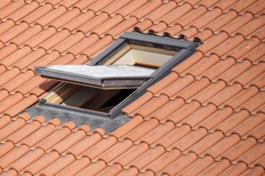 Roof with vasistas or velux windows . clipart